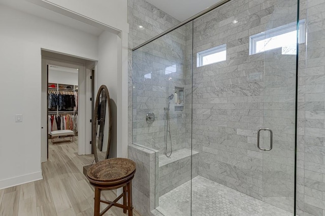 6014 Warpath Rd, Flowery Branch, GA 30542 - bathroom featuring a shower stall and a spacious closet