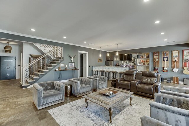 6014 Warpath Rd, Flowery Branch, GA 30542 - living room with stairway, bar with sink, recessed lighting, crown molding, and finished concrete flooring