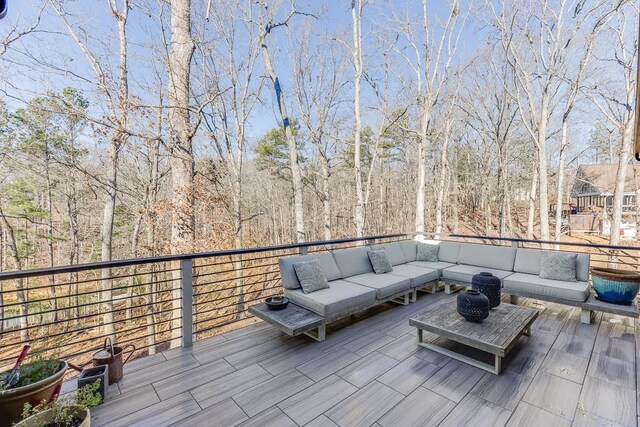 6014 Warpath Rd, Flowery Branch, GA 30542 - wooden deck featuring an outdoor hangout area
