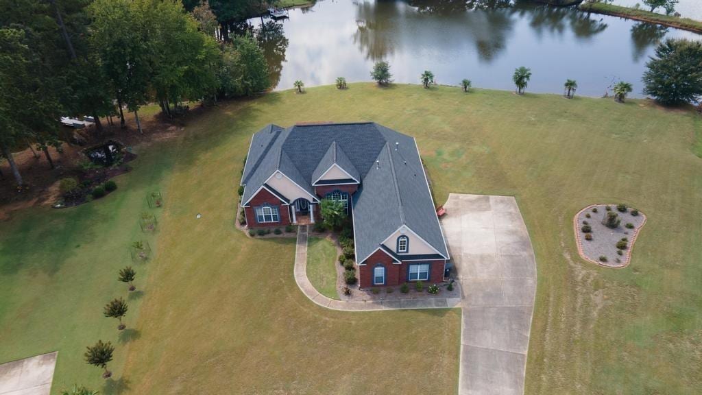 drone / aerial view with a water view