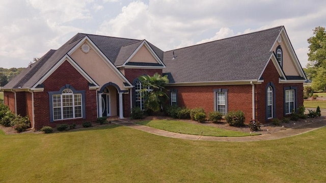 view of property featuring a front yard