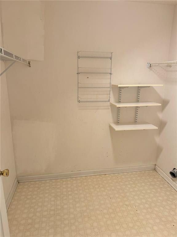 walk in closet featuring tile patterned floors