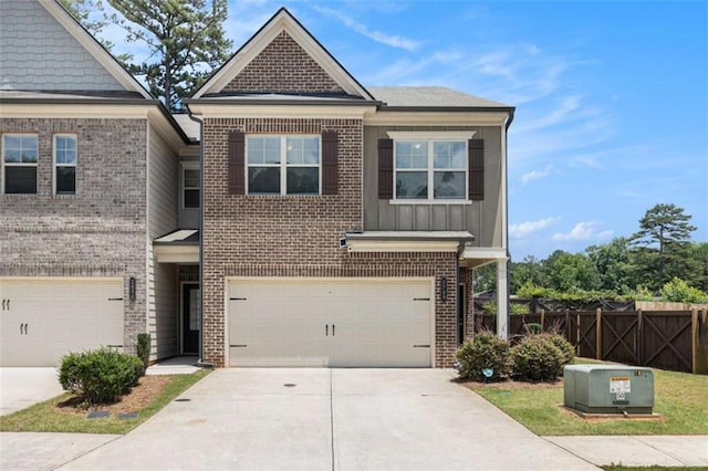 2700 Norwich Trce, Snellville, GA 30078 - view of front of home featuring brick siding, driveway, board and batten siding, and a garage