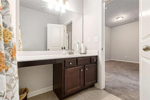 2700 Norwich Trce, Snellville, GA 30078 - bathroom with vanity and baseboards