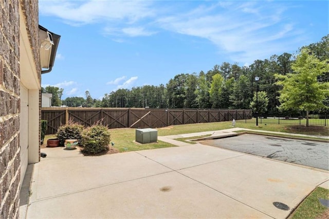 2700 Norwich Trce, Snellville, GA 30078 - fenced backyard featuring a patio