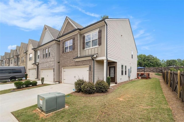 2700 Norwich Trce, Snellville, GA 30078 - view of side of home featuring driveway, brick siding, a garage, and a residential view