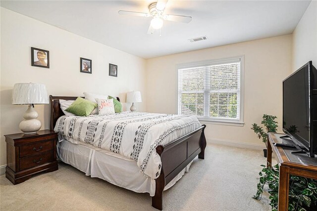 725 Windsor Place Cir SW, Grayson, GA 30017 - bedroom featuring light colored carpet, baseboards, and ceiling fan
