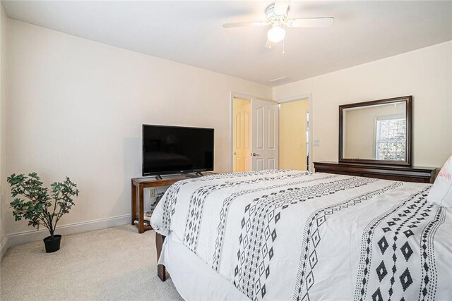725 Windsor Place Cir SW, Grayson, GA 30017 - carpeted bedroom featuring baseboards and a ceiling fan