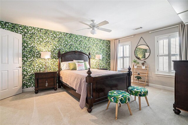 725 Windsor Place Cir SW, Grayson, GA 30017 - carpeted bedroom with wallpapered walls, baseboards, a ceiling fan, and an accent wall