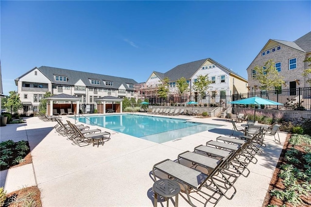 view of swimming pool featuring a patio area