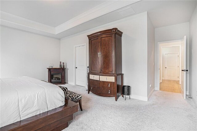bedroom featuring baseboards and carpet