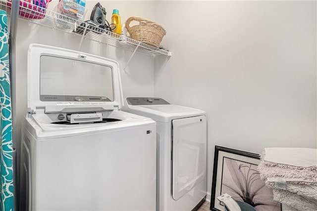 laundry area with independent washer and dryer and laundry area