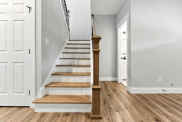 112 Radian Ct, Dallas, GA 30132 - stairway featuring wood finished floors and baseboards