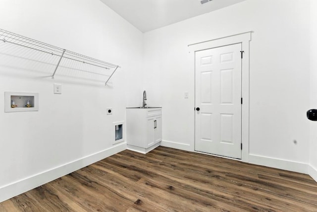 112 Radian Ct, Dallas, GA 30132 - washroom featuring electric dryer hookup, cabinet space, washer hookup, dark wood-style floors, and baseboards
