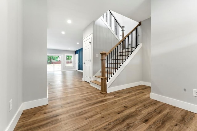 112 Radian Ct, Dallas, GA 30132 - stairs featuring baseboards, wood finished floors, and recessed lighting
