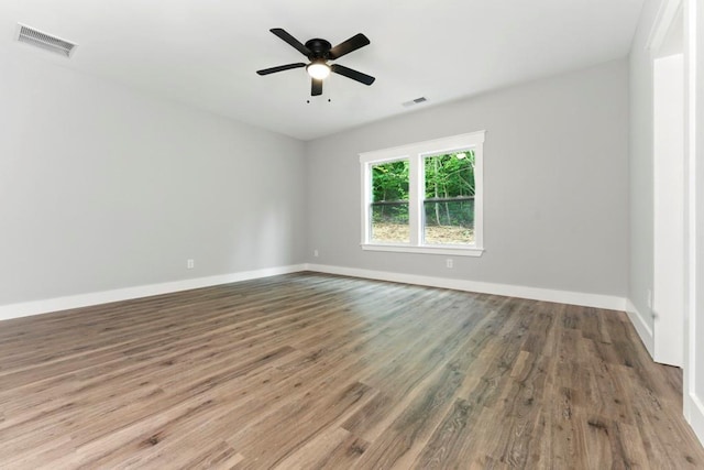 112 Radian Ct, Dallas, GA 30132 - unfurnished room with wood finished floors, a ceiling fan, and baseboards