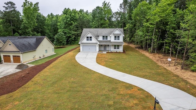 112 Radian Ct, Dallas, GA 30132 - view of front facade featuring concrete driveway, covered porch, a front yard, and a view of trees