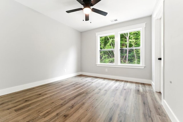 112 Radian Ct, Dallas, GA 30132 - unfurnished room featuring baseboards, wood finished floors, and ceiling fan