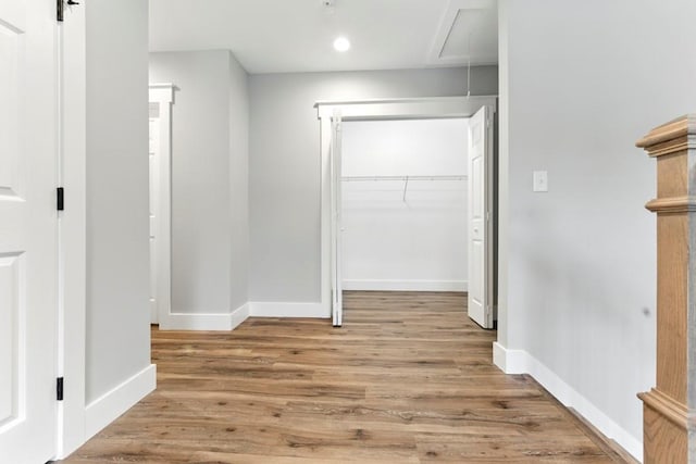 112 Radian Ct, Dallas, GA 30132 - unfurnished bedroom with attic access, a closet, baseboards, light wood-type flooring, and recessed lighting