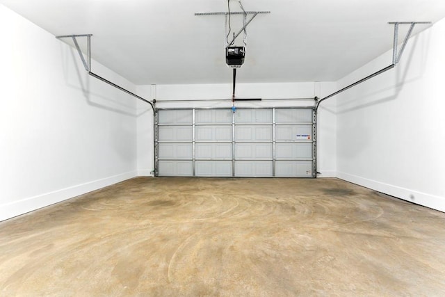 112 Radian Ct, Dallas, GA 30132 - garage featuring baseboards and a garage door opener