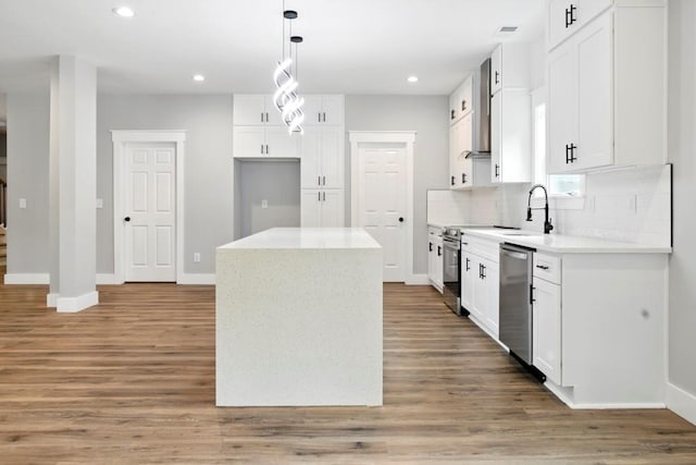 112 Radian Ct, Dallas, GA 30132 - kitchen with stainless steel appliances, a kitchen island, tasteful backsplash, baseboards, and recessed lighting