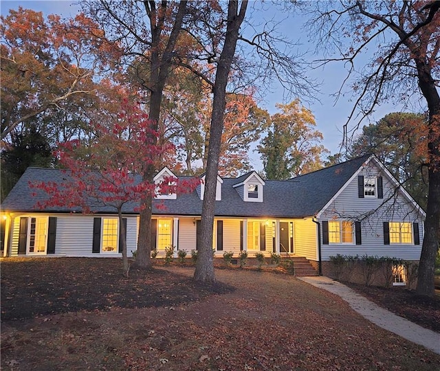 view of new england style home