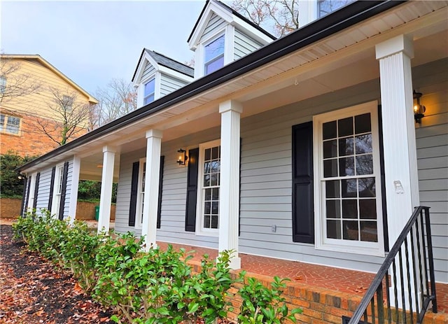 view of home's exterior with covered porch