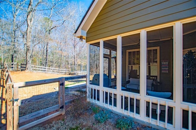 view of yard featuring a sunroom