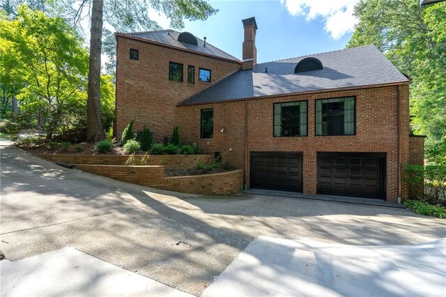 exterior space with a garage