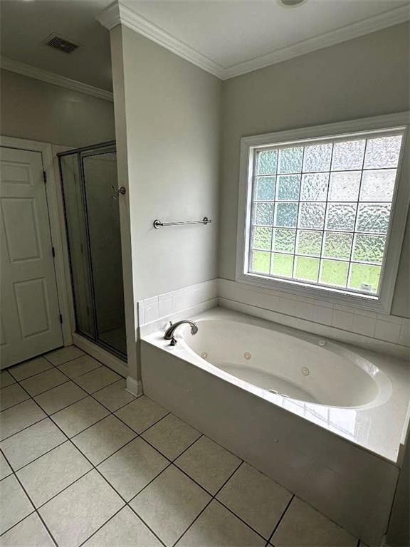 114 Vinings Way SE, Calhoun, GA 30701 - laundry area featuring hookup for a washing machine, cabinet space, light tile patterned flooring, and hookup for an electric dryer