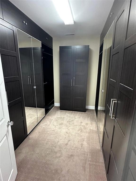 114 Vinings Way SE, Calhoun, GA 30701 - unfurnished bedroom with light colored carpet and baseboards