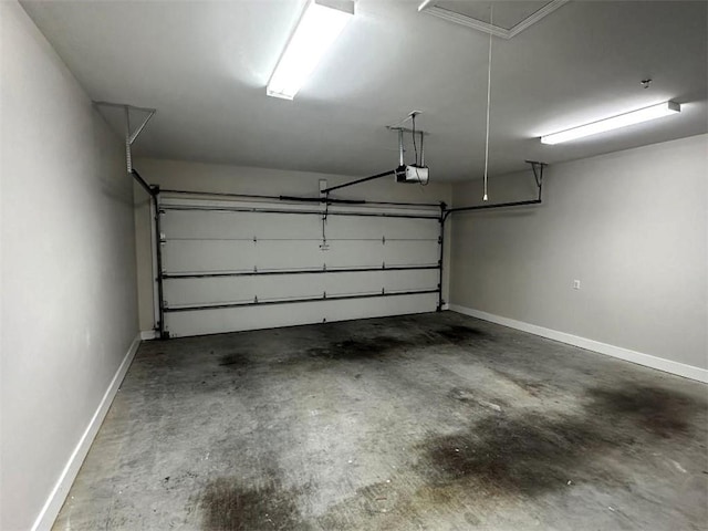 114 Vinings Way SE, Calhoun, GA 30701 - garage with a garage door opener and baseboards
