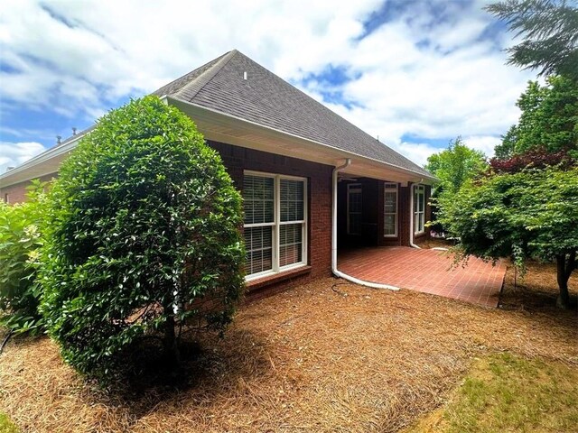 114 Vinings Way SE, Calhoun, GA 30701 - corridor featuring decorative columns, ornamental molding, baseboards, and dark wood-style floors
