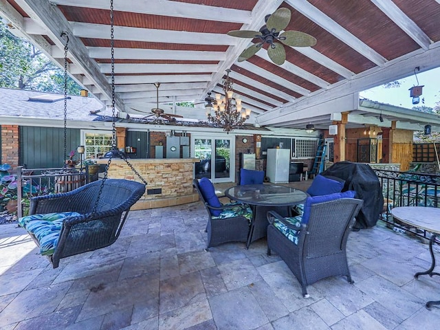 view of patio / terrace with ceiling fan and a grill