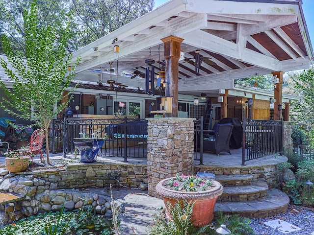 view of patio with ceiling fan