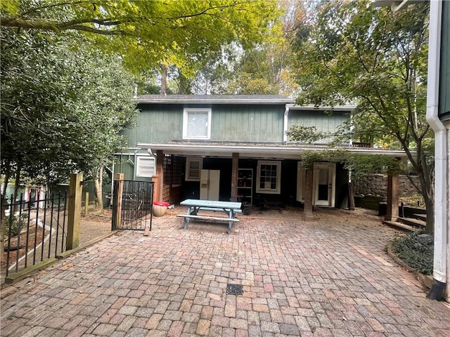 rear view of property with a patio area