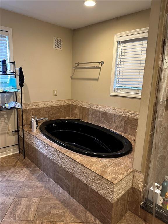 bathroom with plus walk in shower