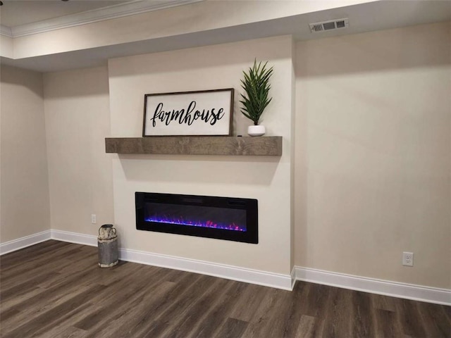 room details featuring hardwood / wood-style flooring and ornamental molding