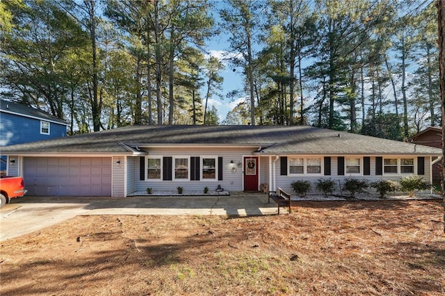 ranch-style home with a garage