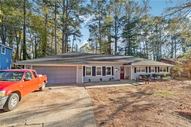 ranch-style home with a garage