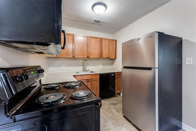 kitchen with sink and black appliances