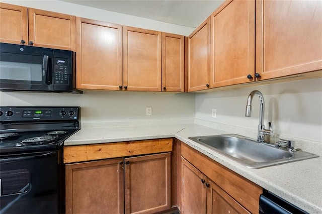 kitchen featuring sink and black appliances