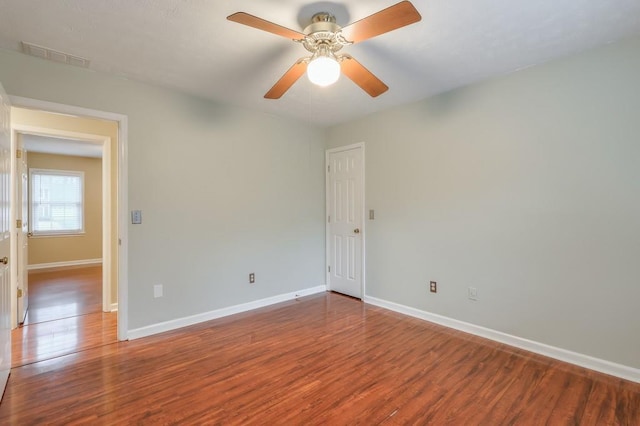 unfurnished room featuring wood-type flooring and ceiling fan