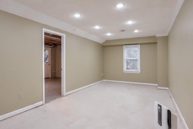 empty room with vaulted ceiling