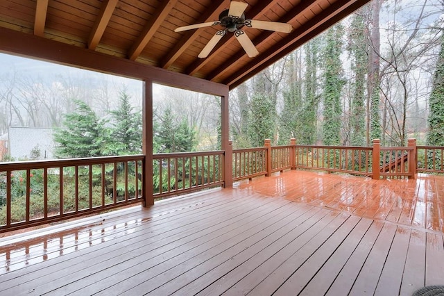 wooden terrace featuring ceiling fan