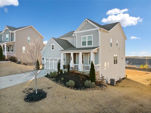 view of front of property featuring covered porch and cooling unit