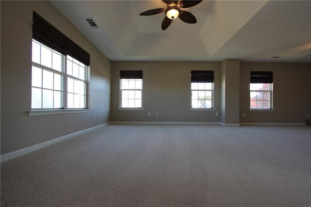 empty room with carpet and baseboards