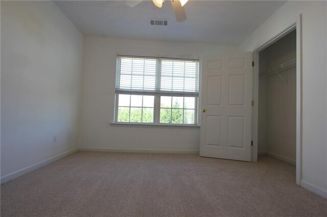 unfurnished room featuring baseboards and carpet flooring