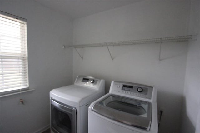 laundry room with washing machine and dryer and laundry area