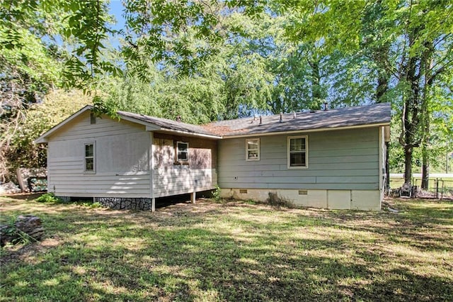 back of property featuring crawl space